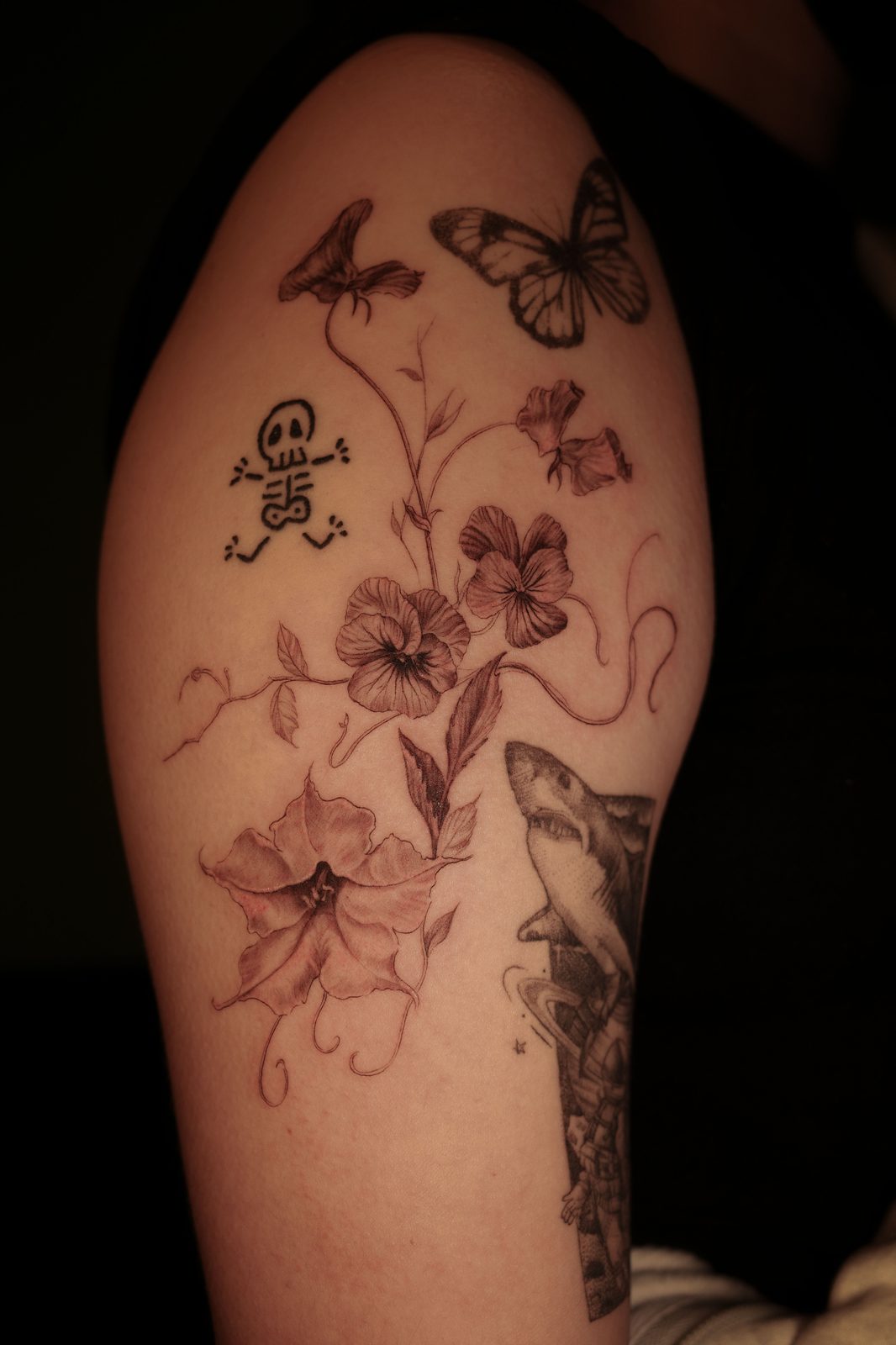 Free-hand botanical tattoo by Dasha Chau
