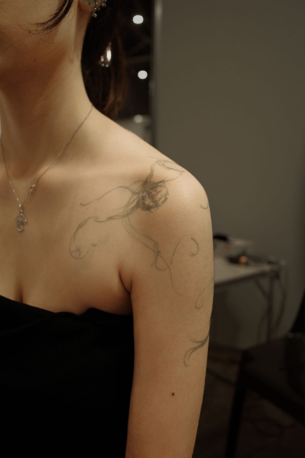 Free-hand botanical tattoo by Dasha Chau