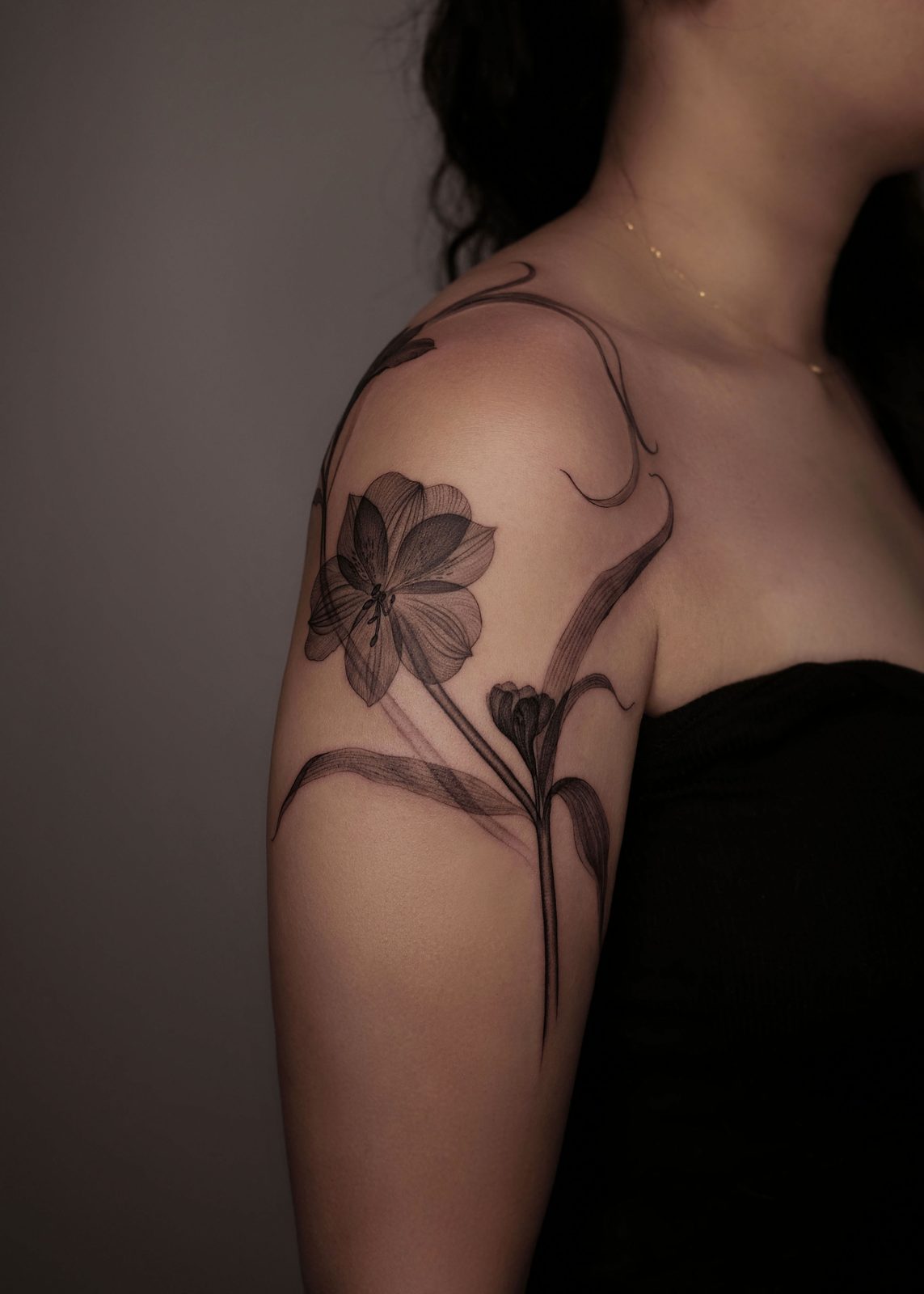 Free-hand botanical tattoo by Dasha Chau